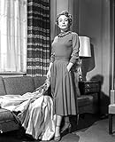 Joan Crawford beside a sofa Photo Print (8 x 10)